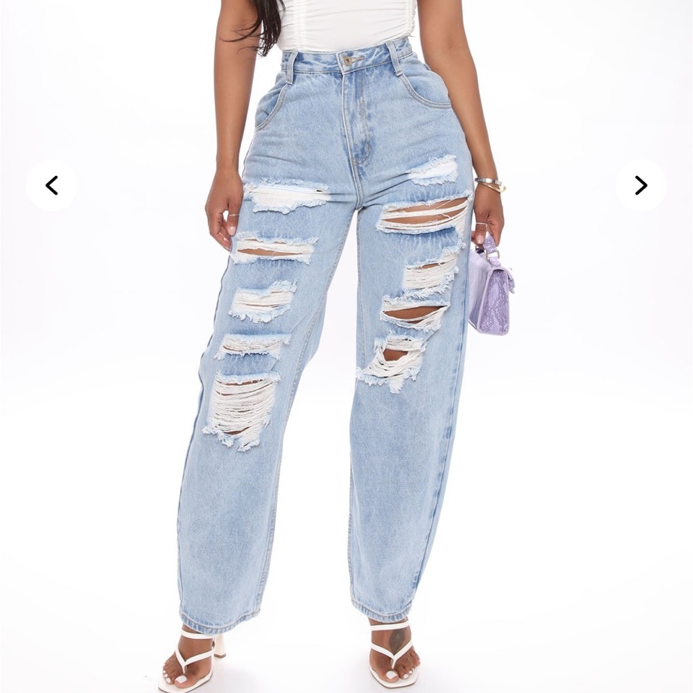 Woman’s Never Let Go Distressed Boyfriend Jeans.